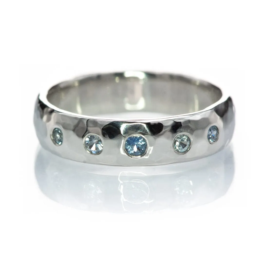 Domed Wedding Band with Graduated Flush set Montana Sapphire